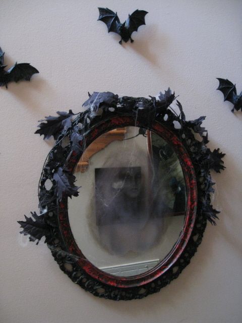 Mirror with a foggy, cracked effect, adding a haunted, eerie ambiance.