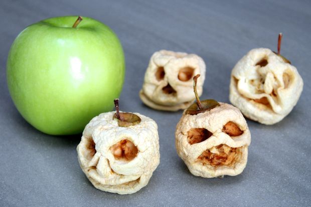 Carved apple heads.